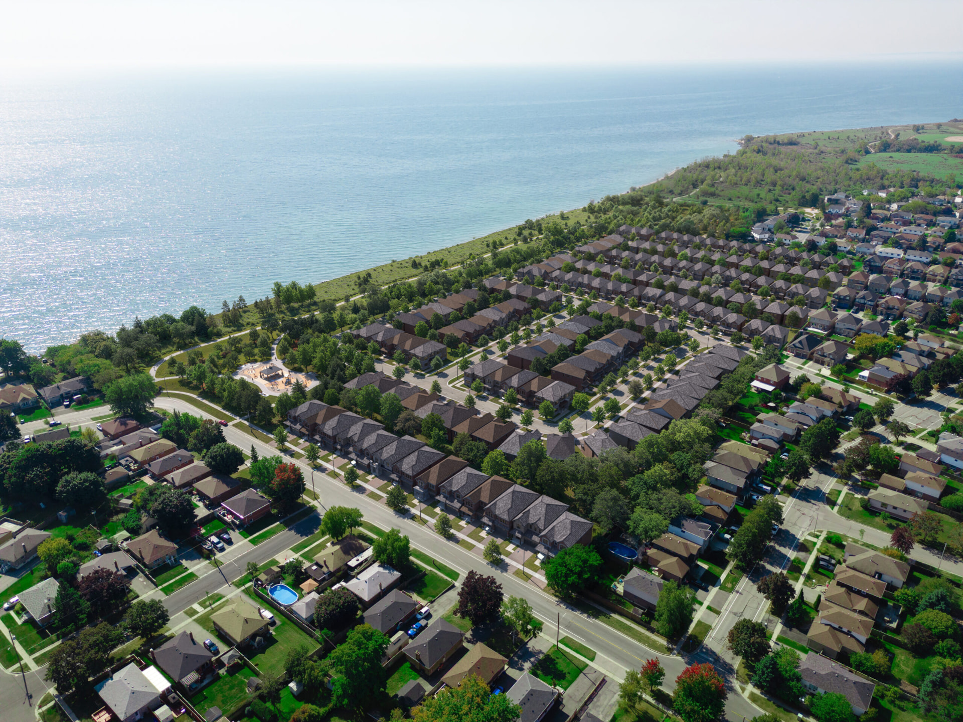 Aerial view of Park and Lake looking across the rooftops to Lake Ontario